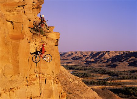 simsearch:841-07083087,k - Rock Climbers Rappelling with Mountain Bikes, Milk River Valley Alberta, Canada Stock Photo - Rights-Managed, Code: 700-00075878