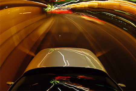 simsearch:700-00089787,k - Blurred View of Highway Traffic With Light Trails at Night Stock Photo - Rights-Managed, Code: 700-00076026
