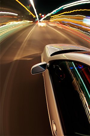 simsearch:700-00089787,k - Blurred View of Highway Traffic With Light Trails at Night Stock Photo - Rights-Managed, Code: 700-00076028
