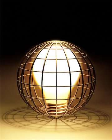 simsearch:700-00077410,k - Glowing Lightbulb in Wire Sphere Stock Photo - Rights-Managed, Code: 700-00077409