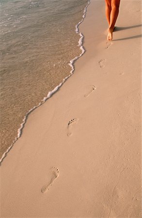 simsearch:700-00085279,k - Woman Walking on Beach, Leaving Footprints Stock Photo - Rights-Managed, Code: 700-00078059