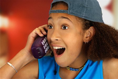 simsearch:695-03388764,k - Girl Using Cordless Phone Stock Photo - Rights-Managed, Code: 700-00078118