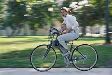 simsearch:400-06412547,k - Mother Riding Bike with Baby Stock Photo - Rights-Managed, Code: 700-00078263