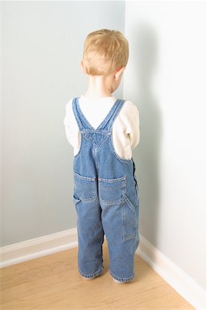 simsearch:700-00078438,k - Back View of Boy Standing in Corner Stock Photo - Rights-Managed, Code: 700-00078436