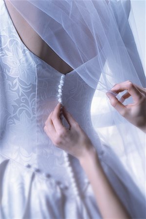 simsearch:700-00078450,k - Hands Fastening Buttons on Bridal Gown Stock Photo - Rights-Managed, Code: 700-00078456