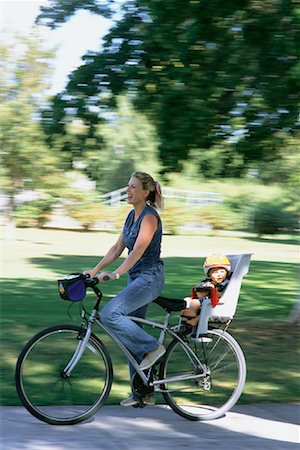 simsearch:400-06412547,k - Mother Riding Bike in Park with Child Stock Photo - Rights-Managed, Code: 700-00078649