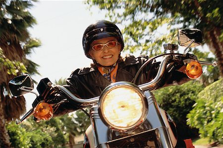 simsearch:700-00027399,k - Mature Woman Riding Motorcycle Stock Photo - Rights-Managed, Code: 700-00078797