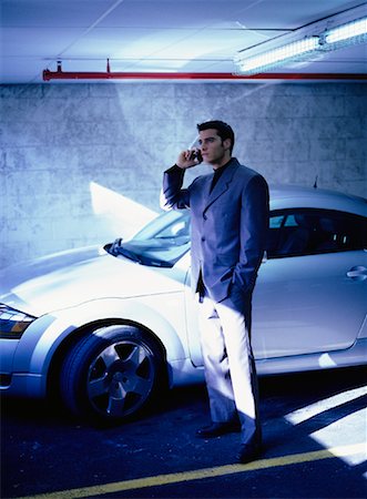 simsearch:700-00163379,k - Businessman Standing near Car Using Cell Phone Stock Photo - Rights-Managed, Code: 700-00070598
