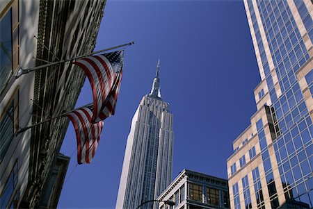 simsearch:700-00429489,k - Looking Up at Empire State Building and Office Towers New York, New York, USA Stock Photo - Rights-Managed, Code: 700-00071000