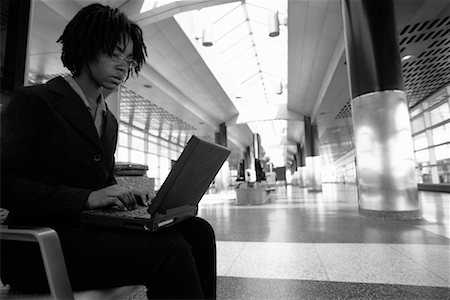 simsearch:700-00083403,k - Businesswoman Using Laptop in Terminal Stock Photo - Rights-Managed, Code: 700-00071149