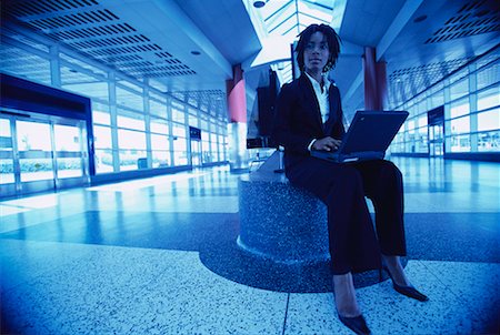 simsearch:700-00083403,k - Businesswoman Using Laptop in Terminal Stock Photo - Rights-Managed, Code: 700-00071156
