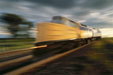 simsearch:700-00082932,k - Blurred View of Speeding Train At Sunset Stock Photo - Rights-Managed, Code: 700-00073102
