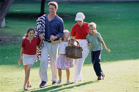 simsearch:700-00073572,k - Family Walking through Field with Picnic Basket and Blanket Stock Photo - Rights-Managed, Code: 700-00073561