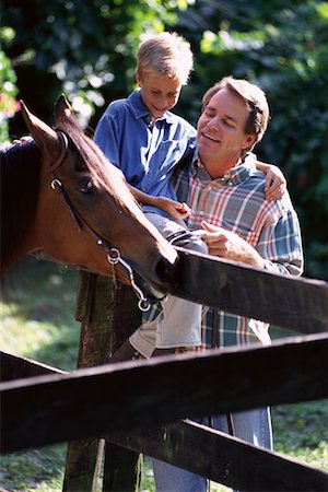 simsearch:700-00073572,k - Father and Son Looking at Horse On Ranch Stock Photo - Rights-Managed, Code: 700-00073575