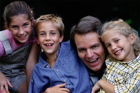 simsearch:700-00069467,k - Portrait of Family Outdoors Stock Photo - Rights-Managed, Code: 700-00073570