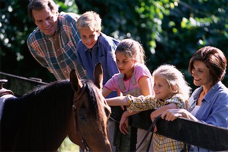 simsearch:700-00073572,k - Family Looking at Horse on Ranch Stock Photo - Rights-Managed, Code: 700-00073572