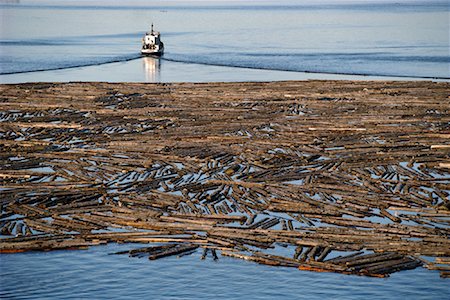 Log Boom and Boat Ottawa River, Bryson, Quebec Canada Stock Photo - Rights-Managed, Code: 700-00084425