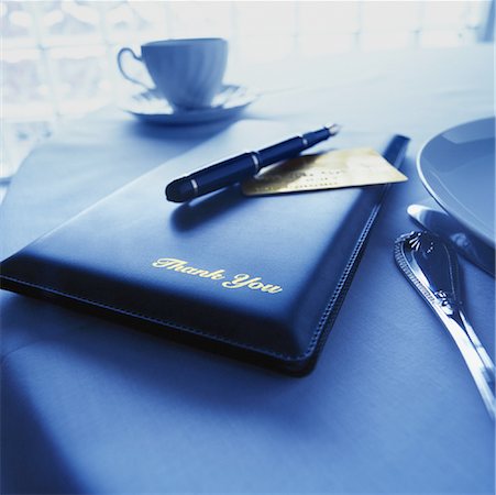 simsearch:700-00085293,k - Credit Card, Fountain Pen and Bill Holder on Restaurant Table Stock Photo - Rights-Managed, Code: 700-00085290