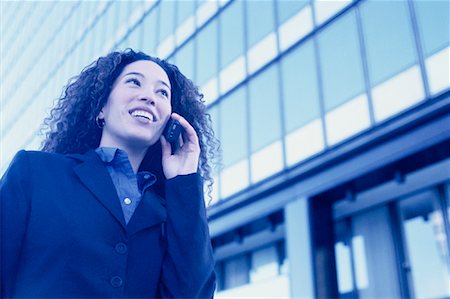 simsearch:700-00189516,k - Businesswoman Using Cell Phone Outdoors Stock Photo - Rights-Managed, Code: 700-00086288