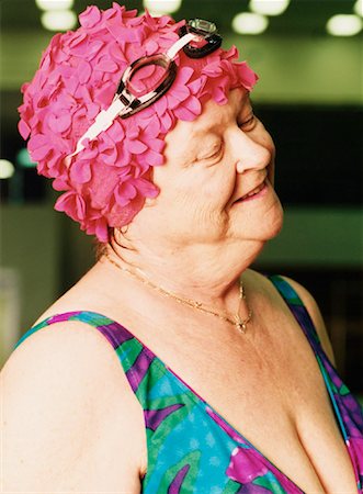 Mature Woman in Pink Bathing Cap Foto de stock - Con derechos protegidos, Código: 700-00088918