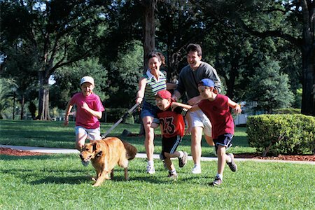 simsearch:700-00073572,k - Family Running With Dog Stock Photo - Rights-Managed, Code: 700-00089234