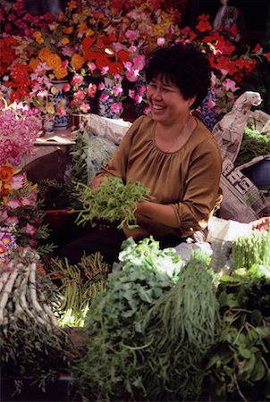 simsearch:700-01954936,k - Woman at Vegetable Stand in Pak Klong Market Bangkok, Thailand Stock Photo - Rights-Managed, Code: 700-00080034