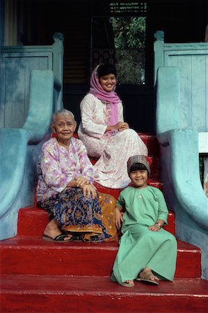 simsearch:700-00054446,k - Portrait of Family Sitting on Steps Malaysia Stock Photo - Rights-Managed, Code: 700-00080058