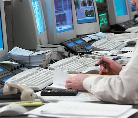 simsearch:700-00641415,k - Man Working at Computer in Stock Market Trading Room Stock Photo - Rights-Managed, Code: 700-00080670