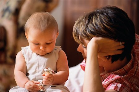 simsearch:700-00080994,k - Mother Lying Down, Watching Baby Playing with Rattle Stock Photo - Rights-Managed, Code: 700-00080994