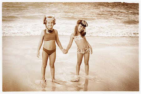 simsearch:700-00088996,k - Portrait of Two Girls in Swimwear On Beach, Wearing Snorkel and Goggles Stock Photo - Rights-Managed, Code: 700-00081658