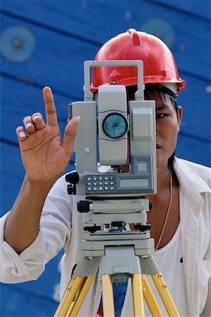 simsearch:700-00049076,k - Construction Worker Using Surveying Instrument Singapore Stock Photo - Rights-Managed, Code: 700-00082496