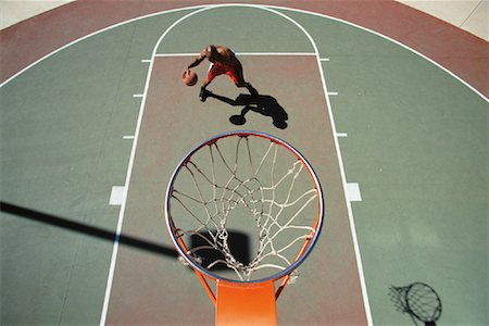simsearch:700-00060777,k - Overhead View of Man Dribbling Basketball near Net Stock Photo - Rights-Managed, Code: 700-00083531