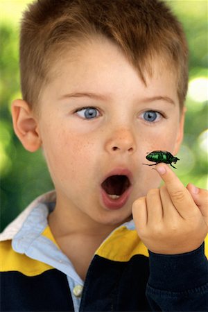 simsearch:700-00477662,k - Boy Looking at Beetle on Fingertip Outdoors Stock Photo - Rights-Managed, Code: 700-00083946