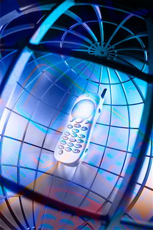 simsearch:700-03058963,k - Wire Globe With Cell Phone Inside Stock Photo - Rights-Managed, Code: 700-00095071