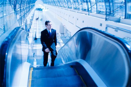 peter griffith - Businessman on Escalator Stock Photo - Rights-Managed, Code: 700-00095470