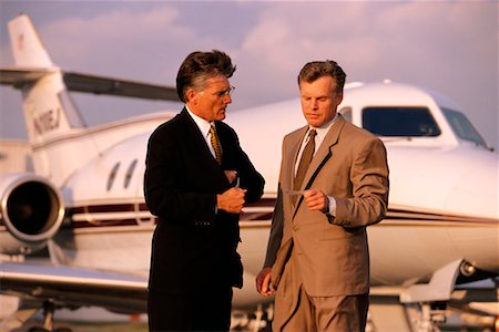 Businessmen by Plane Stock Photo - Rights-Managed, Code: 700-00096841