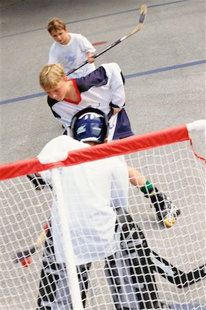 pre teen rollerblading - Street Hockey Stock Photo - Rights-Managed, Code: 700-00097983