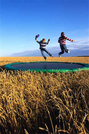 Girls on Trampoline Stock Photo - Rights-Managed, Code: 700-00098657