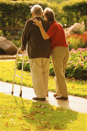Mature Couple Walking in Garden Stock Photo - Rights-Managed, Code: 700-00099914