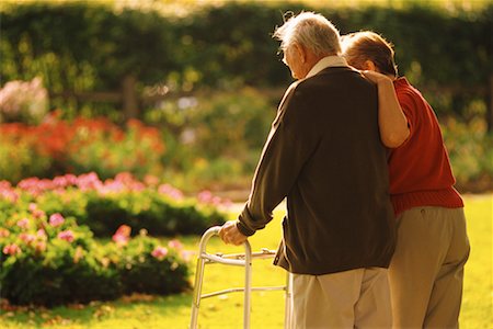 Mature Couple Walking in Garden Stock Photo - Rights-Managed, Code: 700-00099913