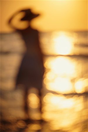 Femme au coucher du soleil Photographie de stock - Rights-Managed, Code: 700-00091198