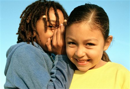 pictures of a little girl whispering - Two Girls Whispering Stock Photo - Rights-Managed, Code: 700-00093455