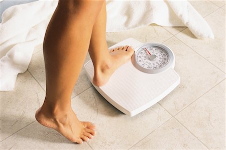simsearch:700-00021673,k - Close Up of Woman's Legs on Bathroom Scale Stock Photo - Rights-Managed, Code: 700-00154184