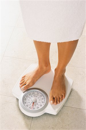 simsearch:700-00021673,k - Close Up of Woman's Legs on Bathroom Scale Stock Photo - Rights-Managed, Code: 700-00154185