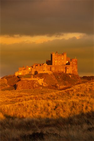 fairy tale castle on a hill - Bamburgh Castle Northumberland, England Stock Photo - Rights-Managed, Code: 700-00155572