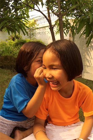 pictures of a little girl whispering - Two Girls Whispering Stock Photo - Rights-Managed, Code: 700-00155958