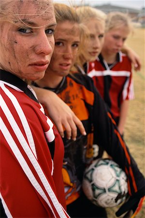 Portrait of Muddy Female Soccer Players Stock Photo - Rights-Managed, Code: 700-00158061