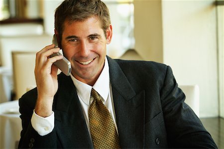 simsearch:700-00163379,k - Portrait of Businessman in Diner Using Cellular Phone Stock Photo - Rights-Managed, Code: 700-00158212