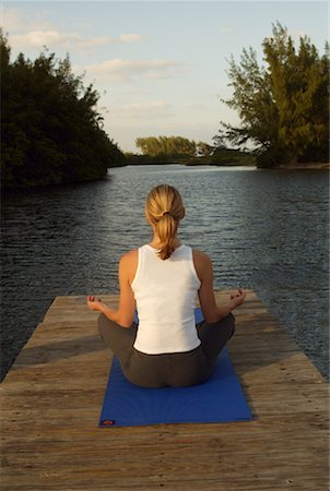Woman Practicing Yoga Foto de stock - Con derechos protegidos, Código: 700-00151574