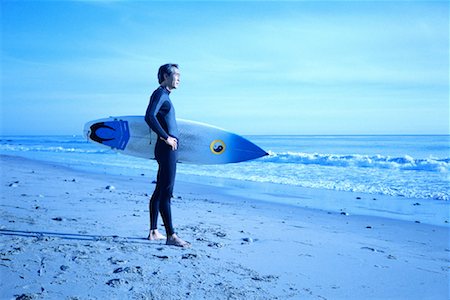 peter griffith - Man Holding Surfboard on Beach Stock Photo - Rights-Managed, Code: 700-00152504